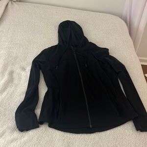 black Lululemon athletic jacket fits tighter